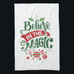 Believe in the Magic Christmas Typography Kitchen Towel<br><div class="desc">A kitchen towel with a cool illustration. Text says Believe in the Magic in fancy lettering. Decorated with christmas balls.</div>