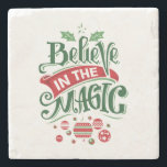 Believe in the Magic Christmas Typography Stone Coaster<br><div class="desc">A stone coaster with a cool illustration. Text says Believe in the Magic in fancy lettering. Decorated with christmas balls.</div>