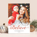 Believe Script Snowflakes Overlay Christmas Photo Holiday Card<br><div class="desc">This beautifully crafted card is a celebration of the season's magic, featuring a graceful "Believe" script delicately woven with snowflakes that overlay your cherished holiday photo. This card is also available as a digital download, so you can easily print it out at home or share it with your friends and...</div>