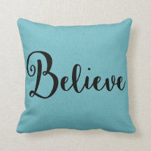 "Believe" Text in Black on Blue Pillow