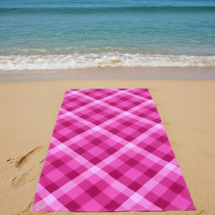 Belle serviette de plage à carreaux rose magenta