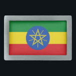 Belt Buckle with Flag of Ethiopia<br><div class="desc">This eye-catching belt buckle featuring the Flag of Ethiopia is a bold statement piece that adds a patriotic touch to any outfit. Showcasing the vibrant green, yellow, and red colours with the iconic emblem at the centre, this belt buckle is perfect for those who take pride in Ethiopia’s rich history...</div>