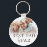 Best Dad By Par Photo Keychain<br><div class="desc">This personalized keychain for a golf loving dad features a clean and classic design with a soft white gradient background. The phrase Best Dad By Par is displayed at the top in a timeless serif font, giving it a heartfelt and meaningful touch. At the bottom, there’s space for a custom...</div>