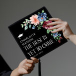 Best is Yet to Come Floral Graduate Graduation Cap Topper<br><div class="desc">Graduate in style! Our exquisitely designed floral graduation cap topper, adorned with blush pink, blue, and burgundy watercolor flowers and luscious green succulents, is sure to make you stand out! Prominently featuring a white mortarboard symbol and personalized with your name and class year, it proudly declares 'The best is yet...</div>