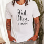 Best Man Black Script Personalized Wedding T-Shirt<br><div class="desc">Wedding Best Man shirt features modern black swirling calligraphy script writing with elegant custom first name text that you can personalize. See our coordinating bridal party designs!</div>