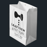 Best Man Wedding Gift Bag with Black Tie<br><div class="desc">This gift bag is designed for your Best Man. The design features black text and a black tie with buttons on a white background. Includes a space for his name as well as the name of the couple and the wedding date. Fill with gifts, favours, candy, booze, or any other...</div>