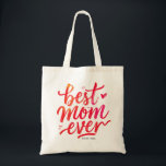 Best Mom Ever Modern Chic Red Script Typography Tote Bag<br><div class="desc">Celebrate your mom in style with this modern chic tote bag featuring a vibrant brush-painted script that reads “Best Mom Ever.” The lettering transitions beautifully from bold red to soft pink, adding a playful, contemporary flair. Sleek and simple, yet eye-catching, the design combines modern elegance with heartfelt charm. Its unique...</div>