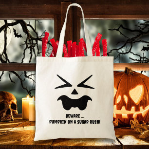 Beware… pumpkin on a sugar rush! Jack O' Lantern Tote Bag