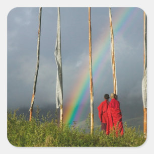 Bhutan, Gangtey village, Rainbow over two monks Square Sticker