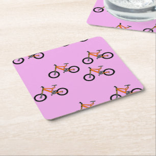 Bicycles pattern on pink square paper coaster