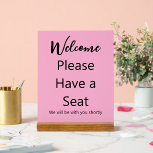 Bienvenue S'il vous plaît avoir un siège rose et n