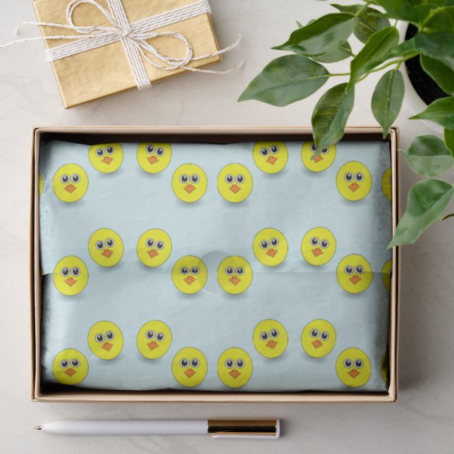 Big head chick on blue tissue paper (Gift)