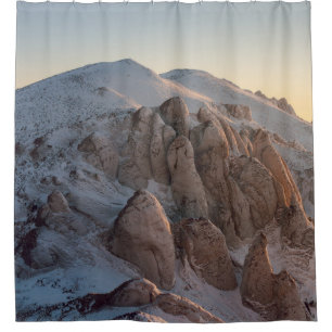 BIG ROCK FORMATIONS COVERED WITH SNOW