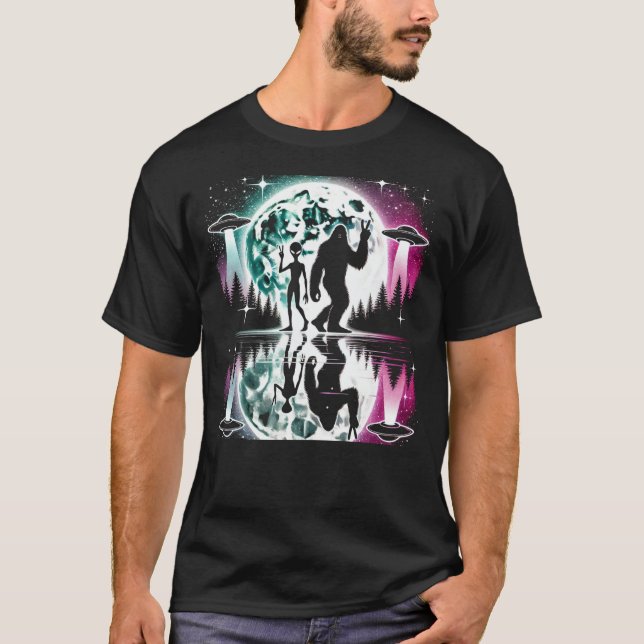 Bigfoot and Alien Under Moon T-Shirt – Cosmic Cryp (Front)