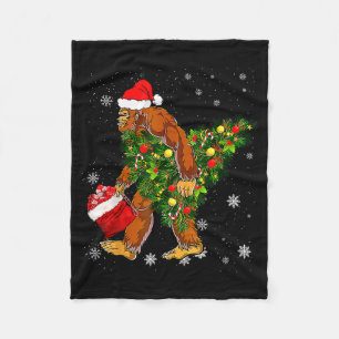 Bigfoot Carrying Christmas Tree Sasquatch Believer Fleece Blanket