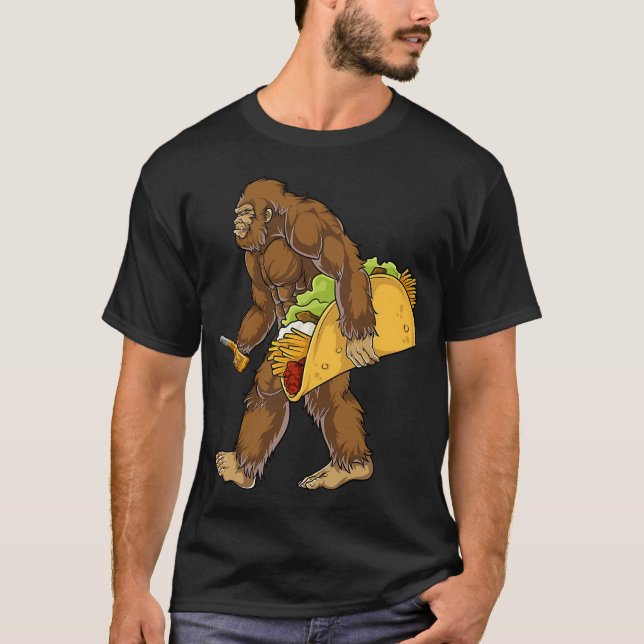 Bigfoot Holding A Tacocarrying A Taco Sasquatch T-Shirt (Front)