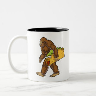 Bigfoot Sasquatch Carrying Taco Two-Tone Coffee Mug