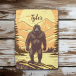 Bigfoot Sasquatch Retro Art Personalized iPad Air Cover<br><div class="desc">Retro Bigfoot or Sasquatch standing on a rock in front of  pine trees and a mountains sunset. Done in vintage colours orange,  yellow and brown.</div>