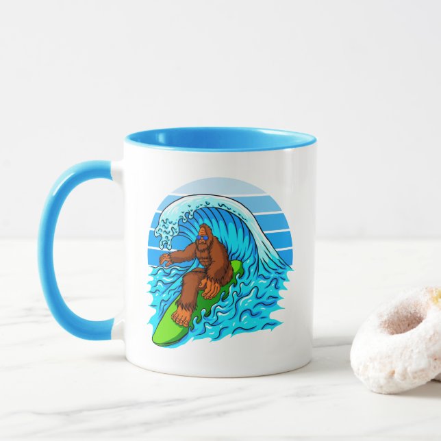 Bigfoot Surfing Riding The Waves Fun Sasquatch Mug (With Donut)