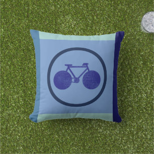 Bike-inspired design of bicycle on geometric blue outdoor pillow