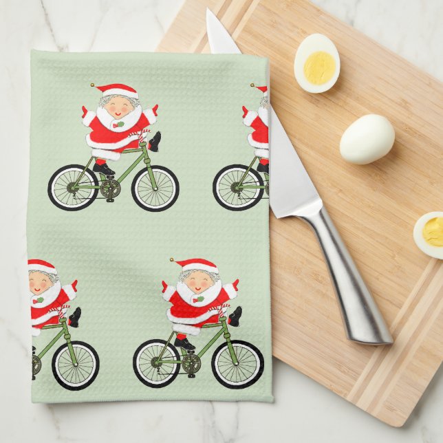 Biking Mrs. Claus Christmas Kitchen Towel (Quarter Fold)