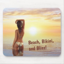 Bikini Girl Posing in the Sea at Sunset