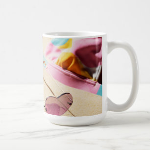 Bikini Top And Heart Shape Sunglasses On Beach Coffee Mug