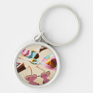 Bikini Top And Heart Shape Sunglasses On Beach Keychain