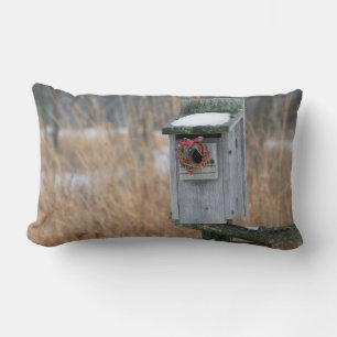 Bird, nest box with holiday wreath in winter lumbar pillow