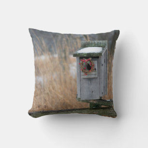 Bird, nest box with holiday wreath in winter throw pillow
