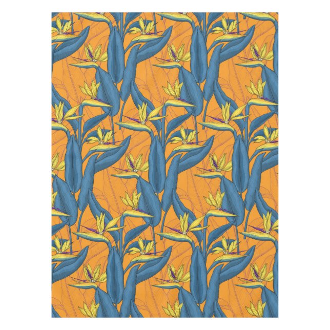 Bird of paradise flowers on orange tablecloth (Front)