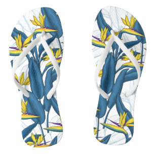 Bird of paradise flowers on white flip flops
