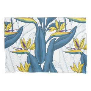 Bird of paradise flowers on white pillowcase