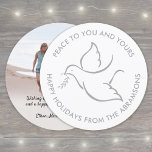 Bird of Peace Modern Dove Unique Round One Photo Holiday Card<br><div class="desc">Wish family and friends a simple gift of peace for the holidays with an elegant dove one photo round greeting card. All wording on this template (including "Peace" on front) is simple to customize, making it suitable for Christmas, New Years, Hanukkah and Rosh Hashanah. The modern minimalist white and grey...</div>