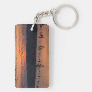Birds at sunrise keychain