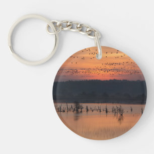 Birds at sunrise keychain