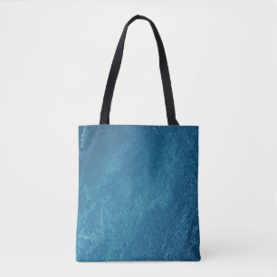 Bird's-eye view of body of water tote bag