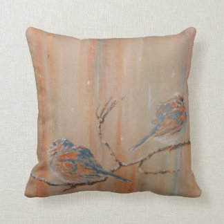 Birds on branch in snow throw pillow