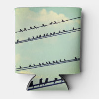 Birds on wires, vintage blue sky.