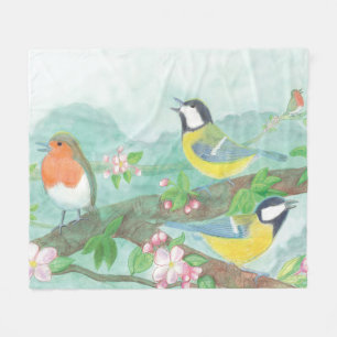 Birds singing on a blossoming tree branch fleece blanket