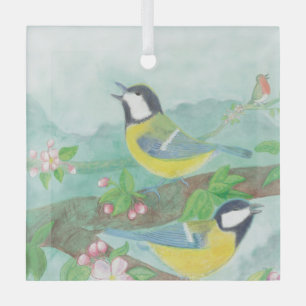 Birds singing on a blossoming tree branch glass ornament