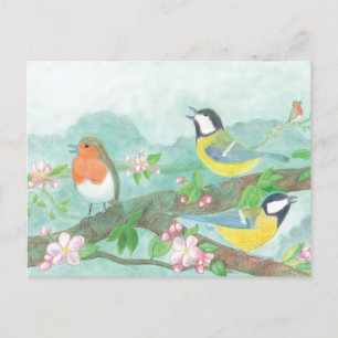 Birds singing on a blossoming tree branch postcard