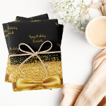 Birthday black gold glitter sparkle monogram name wrapping paper sheet<br><div class="desc">Elegant,  classic,  glamourous and feminine style party wrapping paper. A chic black background decorated with faux golden glitter and sparkle. With a golden bow and ribbon. With the text: Happy Birthday,  golden letters. Personalize and add a name.</div>