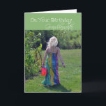 Birthday Granddaughter, young girl in garden Card<br><div class="desc">A birthday card for Granddaughter with a photo of a young blonde haired girl with long summer dress carrying a red bucket walking next to a garden.</div>