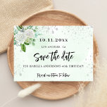 Birthday party floral white green save the date announcement postcard<br><div class="desc">A girly and trendy Save the Date card for a 40th (or any age) birthday party. A stylish white and green watercolored background decorated with faux silver glitter sparkles, white florals and greenery. Personalize and add a date and name/age 40. Black coloured letters. The text: Save the Date is written...</div>