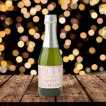 Birthday party night rose gold glitter pink women sparkling wine label<br><div class="desc">A mini sparkling wine bottle label for a girly and glamourous 50th (or any age) birthday party with the girls. A faux rose gold metallic looking background with an elegant faux rose gold glitter drips, paint drip look. The text: The name is written in dark rose gold with a large...</div>