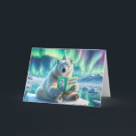 Birthday Polar Bear On an Iceberg Card<br><div class="desc">A polar bear wearing a party hat and glasses sits on an ice floe holding a colourful birthday card</div>