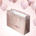 Birthday rose gold glitter pink monogram script large gift bag<br><div class="desc">A gift bag for a girly and glamourous birthday. A faux rose gold background with elegant pink and rose gold glitter drips, paint dripping look. Personalize and add a name and monogram letter. The name is written in burgundy with a modern hand lettered style script with swashes. To keep the...</div>