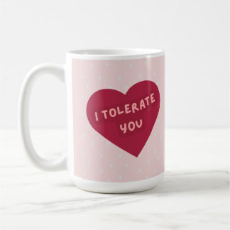 Bizarre 'Je te tolère' mug