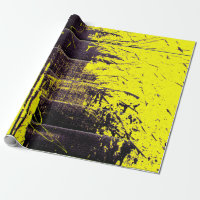 Black abstract splatter paint drips on a bright ye
